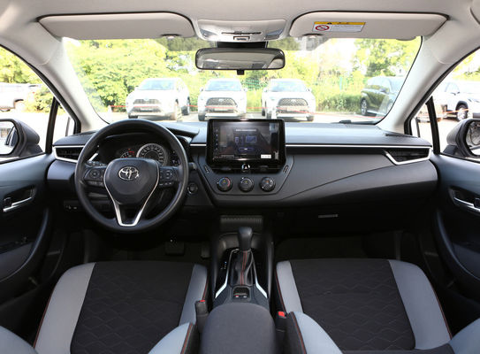 Veicolo elettrico ibrido a prezzi accessibili e Toyota Corolla